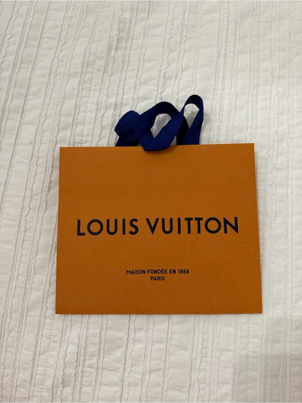 Louis Vuitton Orange Shopping Bag with Blue Ribbon